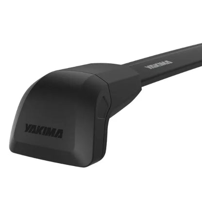 Black Yakima roof rack bar on a white background