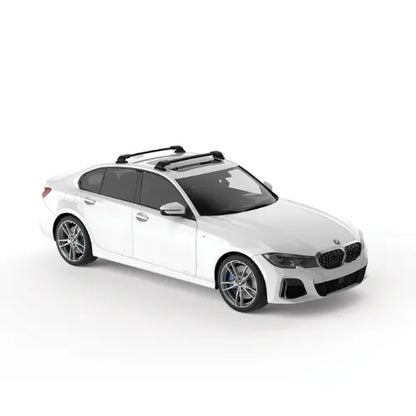 White car with a roof rack on a white background