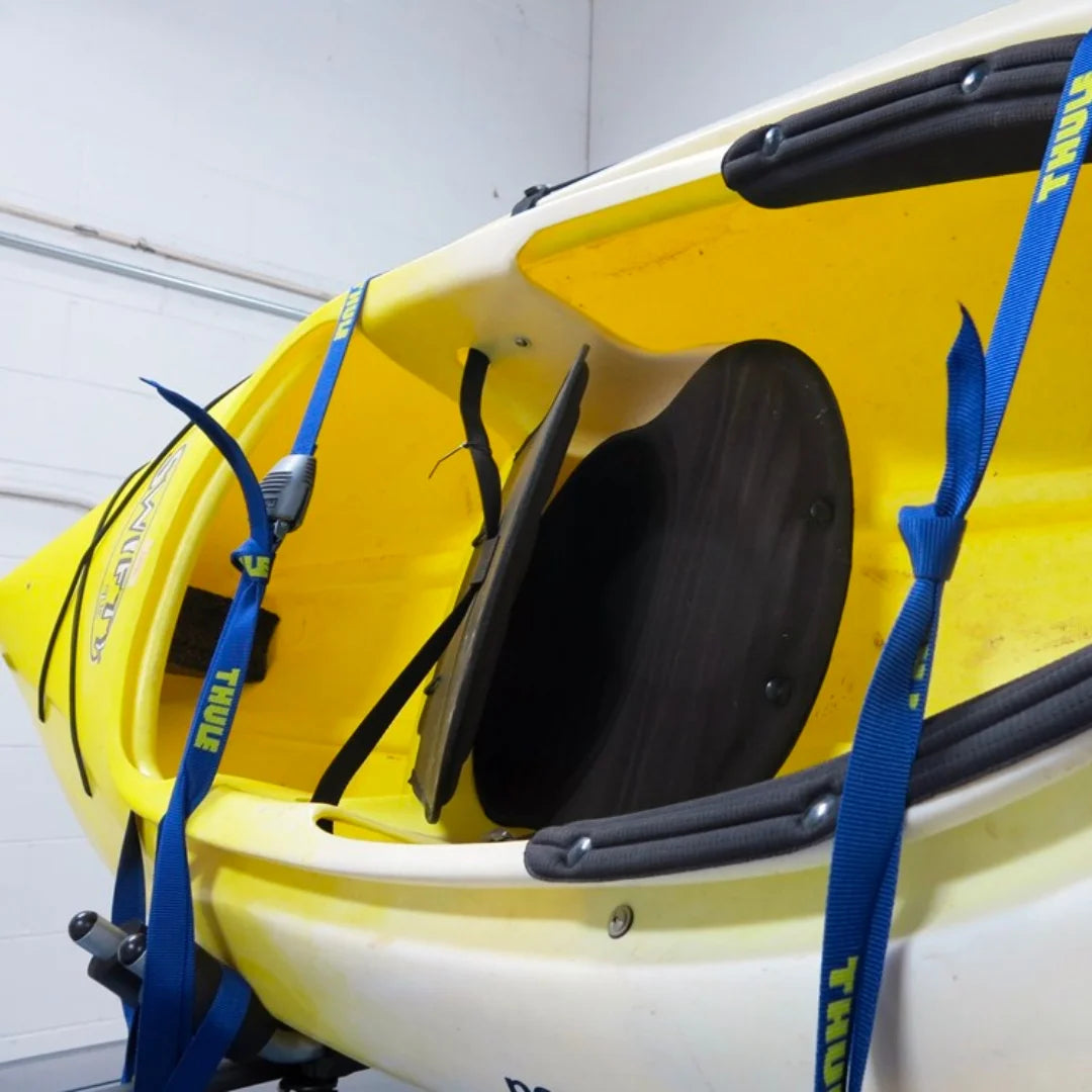 Thule Load Straps wrapped around kayak
