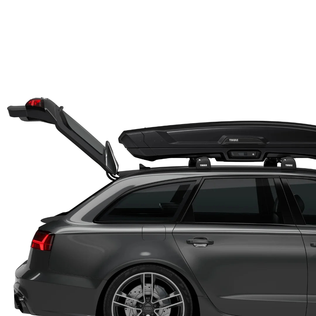 Thule Vector Alpine mounted on a car with trunk open