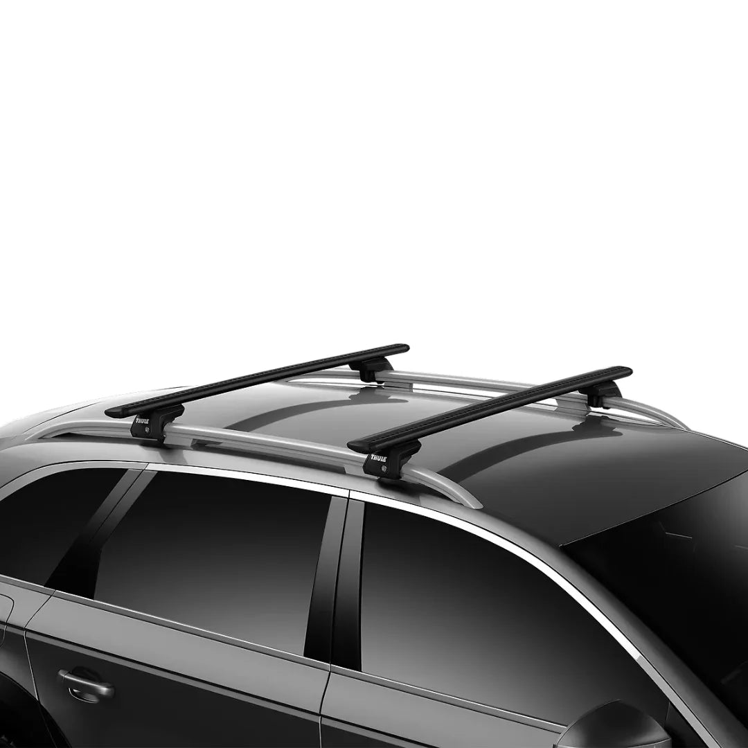 Thule WingBar Evo crossbars mounted on a car roof
