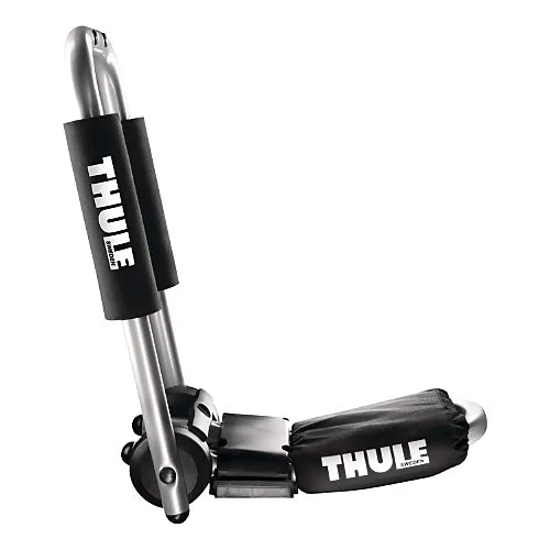 Thule 835 Hull-a-Port Pro J-style kayak rack folded flat for garage clearance – foam-padded cradle arms and Thule branding visible