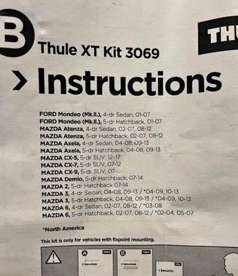 Thule XT Kit 3069 instructions sheet with vehicle compatibility list on a gray background