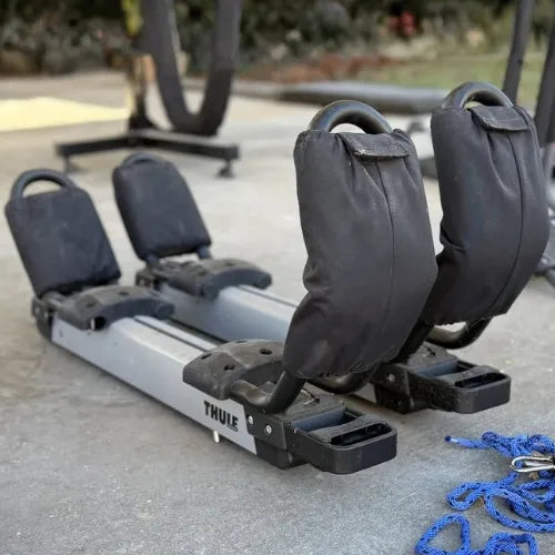 Thule Hullavator Pro  Thule rack on a concrete surface with a blurred background