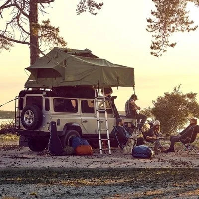 Thule Tepui Explorer Autana Roof Tent - set up with people relaxing under it