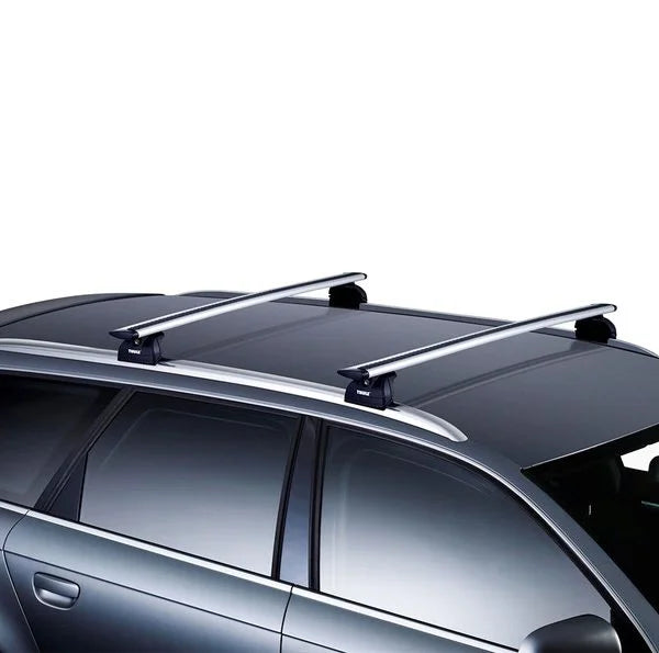 Thule 460R Rapid Podium Foot Pack on the top of a car
