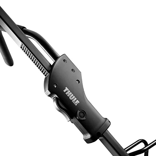 Detailed view of Thule 594XT Sidearm rooftop bike carrier clamping mechanism for secure front wheel 
