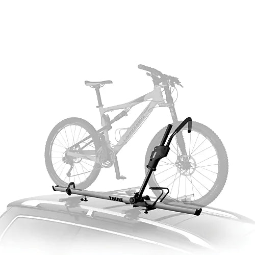 Thule 594XT Sidearm rooftop bike carrier mounted on vehicle roof holding a mountain bike.