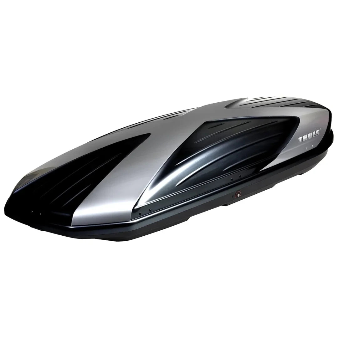 tylish aerodynamic profile of the Thule Boxster showing its silver and black two-tone finish.