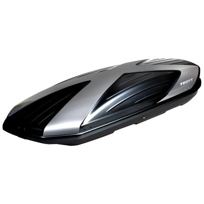 tylish aerodynamic profile of the Thule Boxster showing its silver and black two-tone finish.