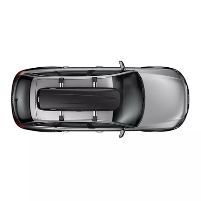 Angled top-down view of car with Thule Pulse Alpine – 3/4 aerial view showing the cargo box installed on the roof of a dark-colored vehicle.