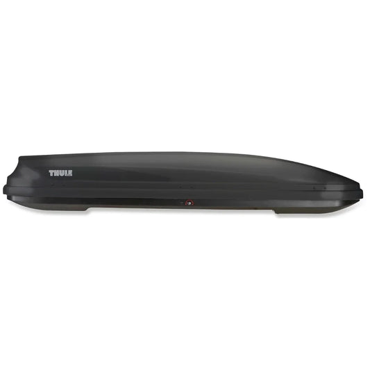 Side view of a Thule rooftop cargo box mounted on a white vehicle roof, showcasing its sleek aerodynamic profile.