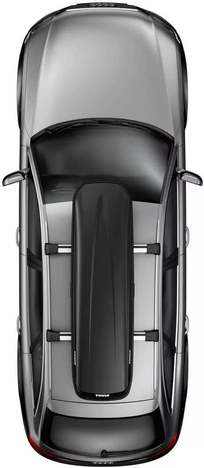 Top-down view of a black Thule Pulse box mounted on a silver vehicle.

