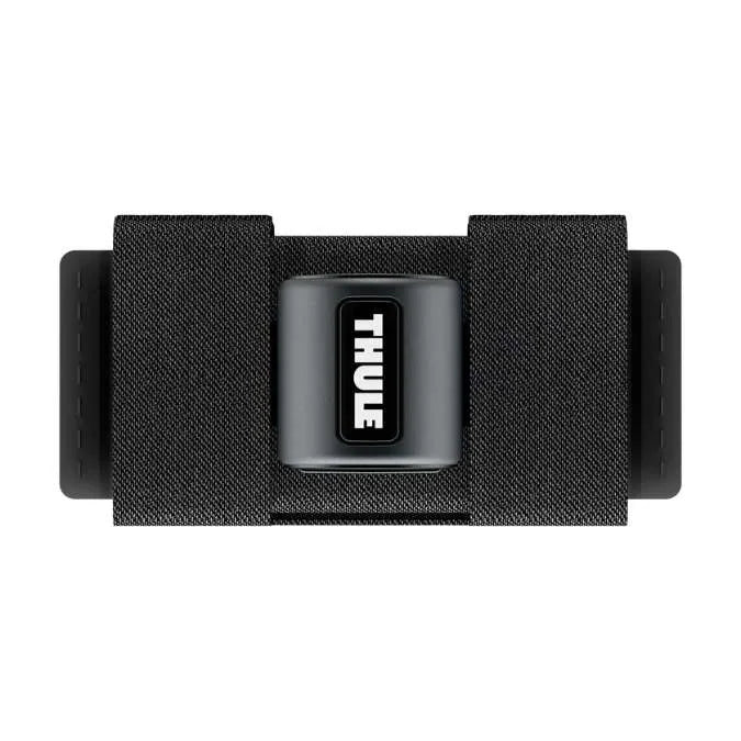 Close-up of Thule SkiClick strap with Thule logo on black fabric

