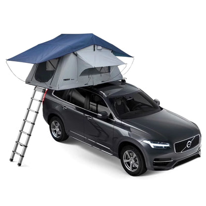 Thule Tepui rooftop tent mounted on black SUV with extended ladder