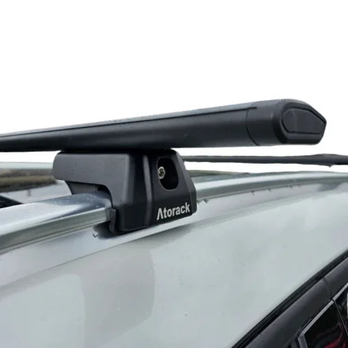 Black universal roof rack crossbars shown with side rail mounting feet for vehicles with integrated or independent side rails.