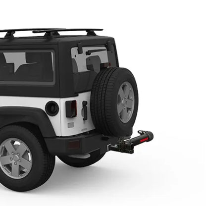 Black and white SUV with a spare tire on a white background