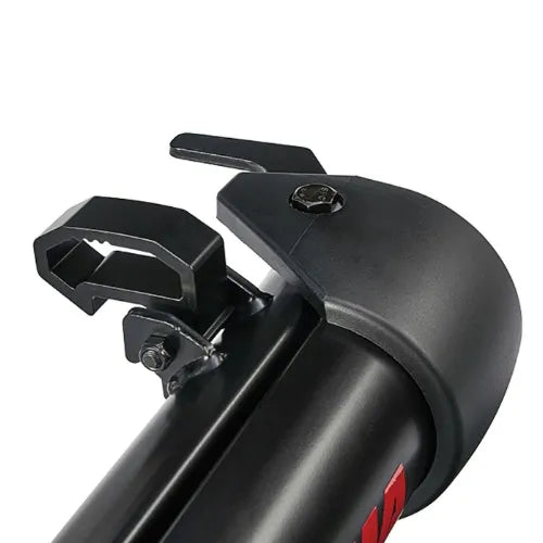 Close-up of a black bike rack with a white background