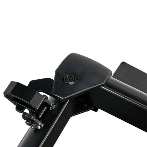 Close-up of a black metal bracket on a white background