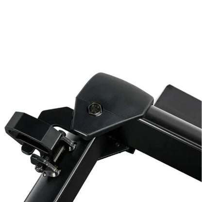 Close-up of a black metal bracket on a white background
