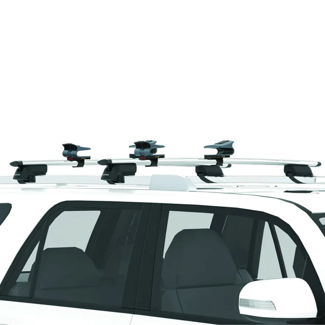 Yakima EvenKeel Rooftop Kayak Saddles on white car