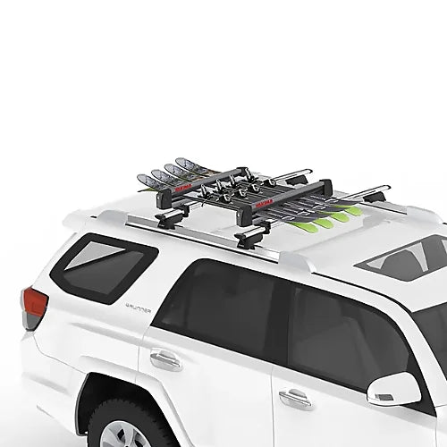 SUV with Yakima FreshTrack ski rack loaded with skis on roof.
