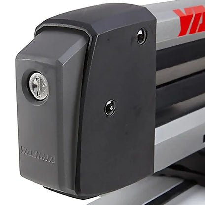 Close-up of Yakima FreshTrack ski rack lock mechanism with key.