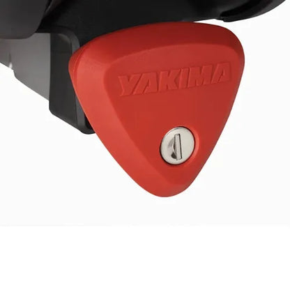Red triangle-shaped lock with 'Yakima' branding on a white background