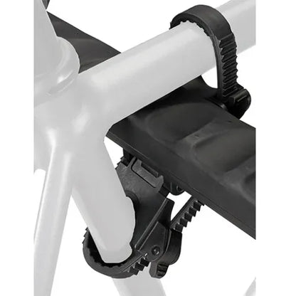 Close-up of a bicycle seat and frame with a black seat post binder on a white background