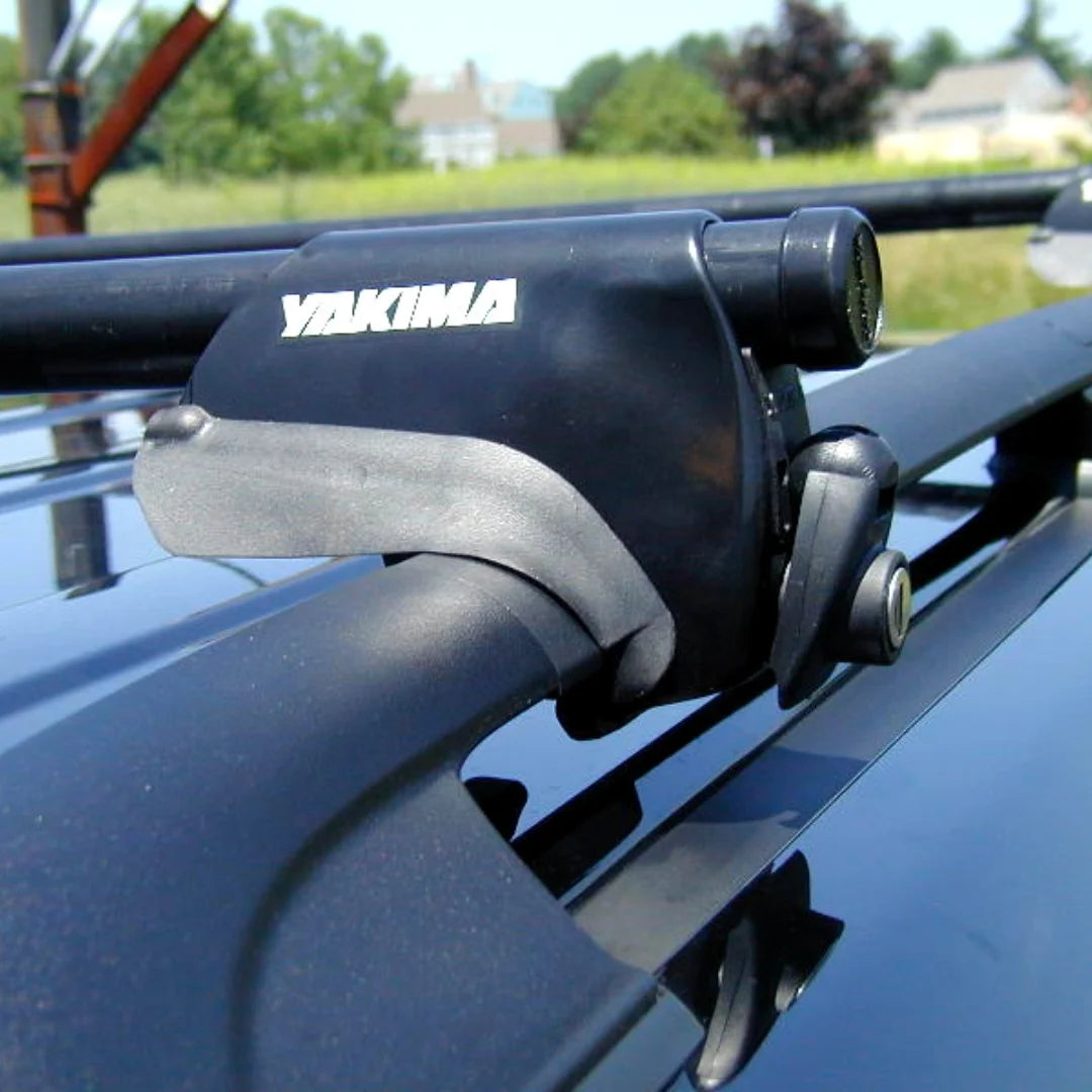 Yakima LowRider Max towers installed on raised factory side rails of a vehicle


