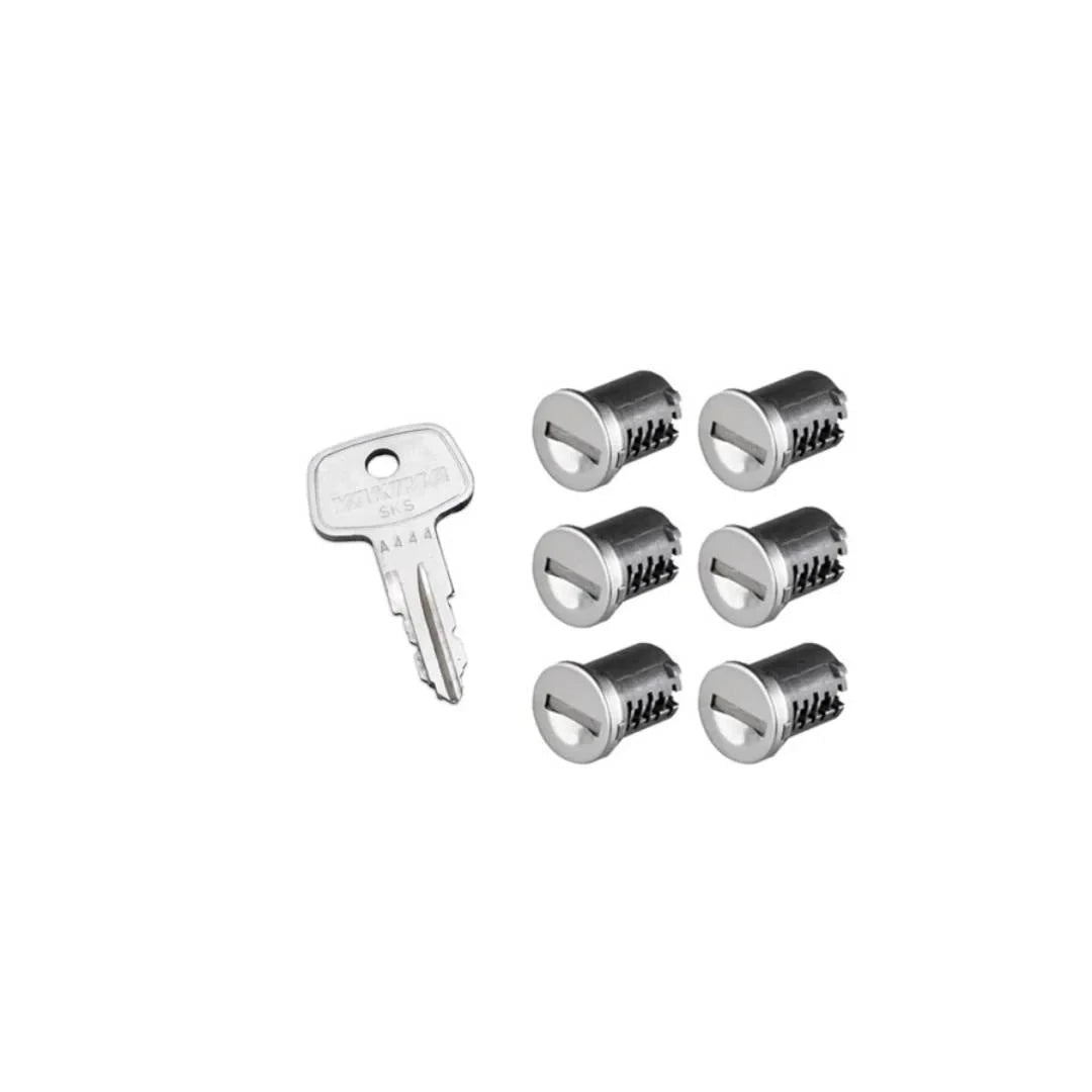 Six Yakima SKS lock cores and key angled slightly

