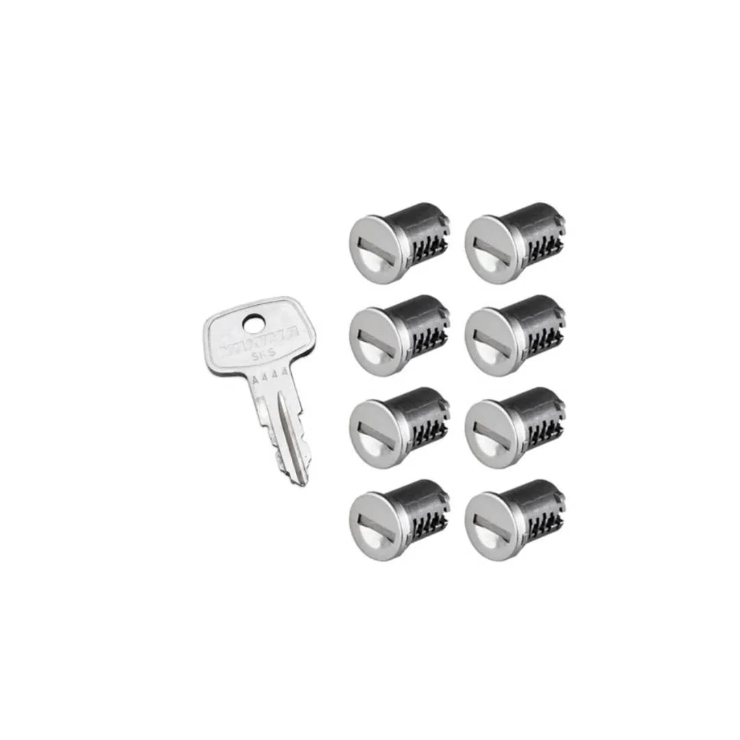 eight Yakima SKS lock cores with key in two rows

