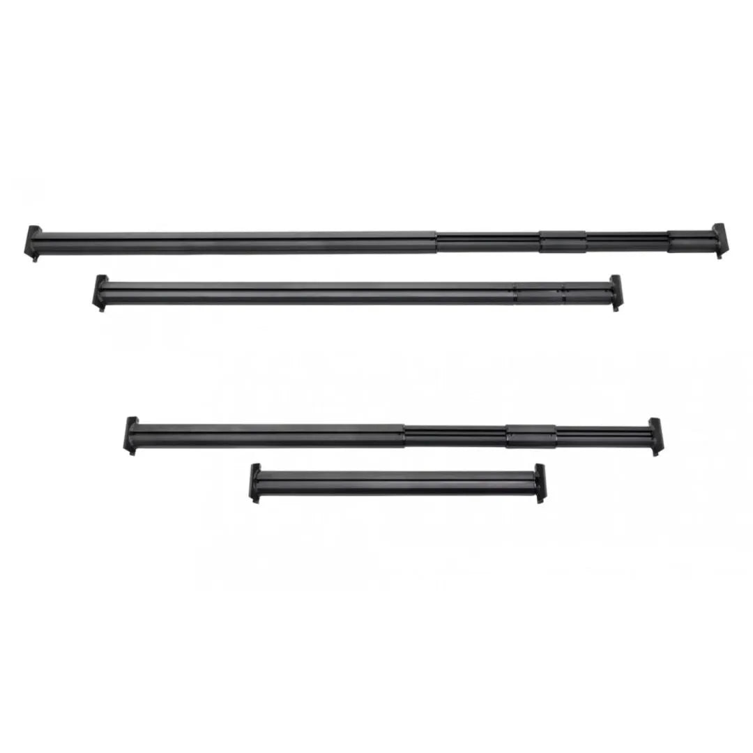 Set of four black metal bars on a white background