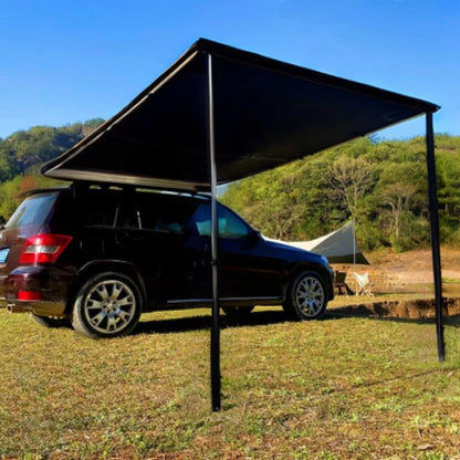 AeroShade AO rooftop awning providing UV-protected shade beside a parked SUV