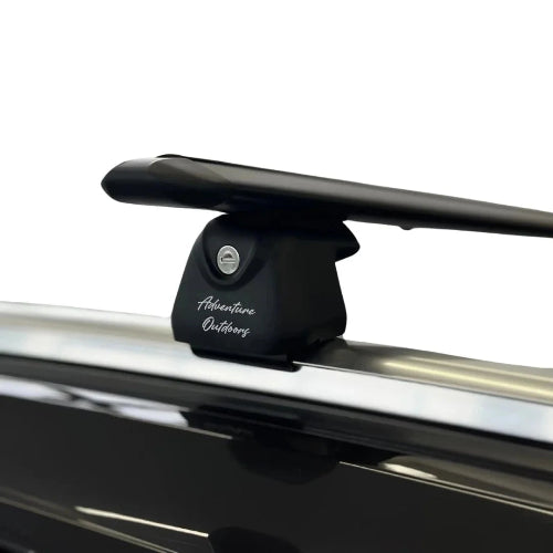 AetherBars AO flush rails roof rack installed on vehicle showing lockable mounting foot and aerodynamic crossbar profile.