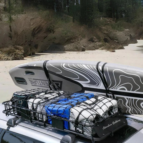 Alloy AO narrow roof basket mounted on vehicle carrying surfboard and secured rooftop cargo with net system