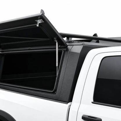 atlas expedition truck cap with open side door and roof racks on top