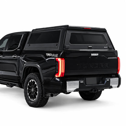 atlas expedition with aero truck cap and sliding windows on a black toyota tundra truck