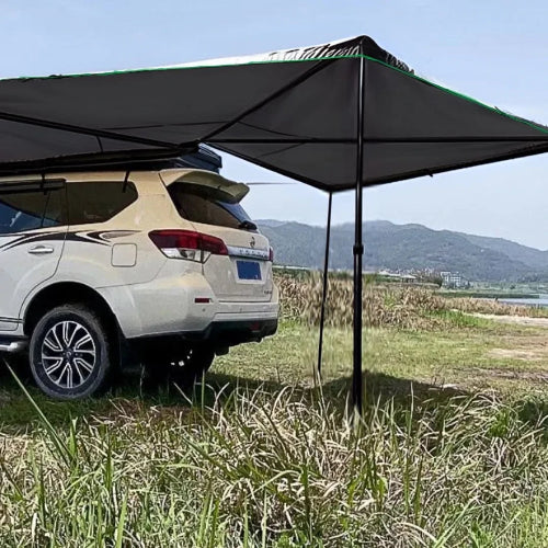 BatShade AO 270 degree batwing rooftop awning installed on SUV providing wide shade coverage for camping