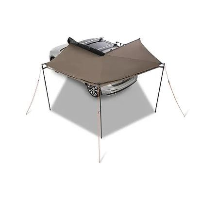 Top-down view of Rhino-Rack Batwing Compact Awning fully deployed around car