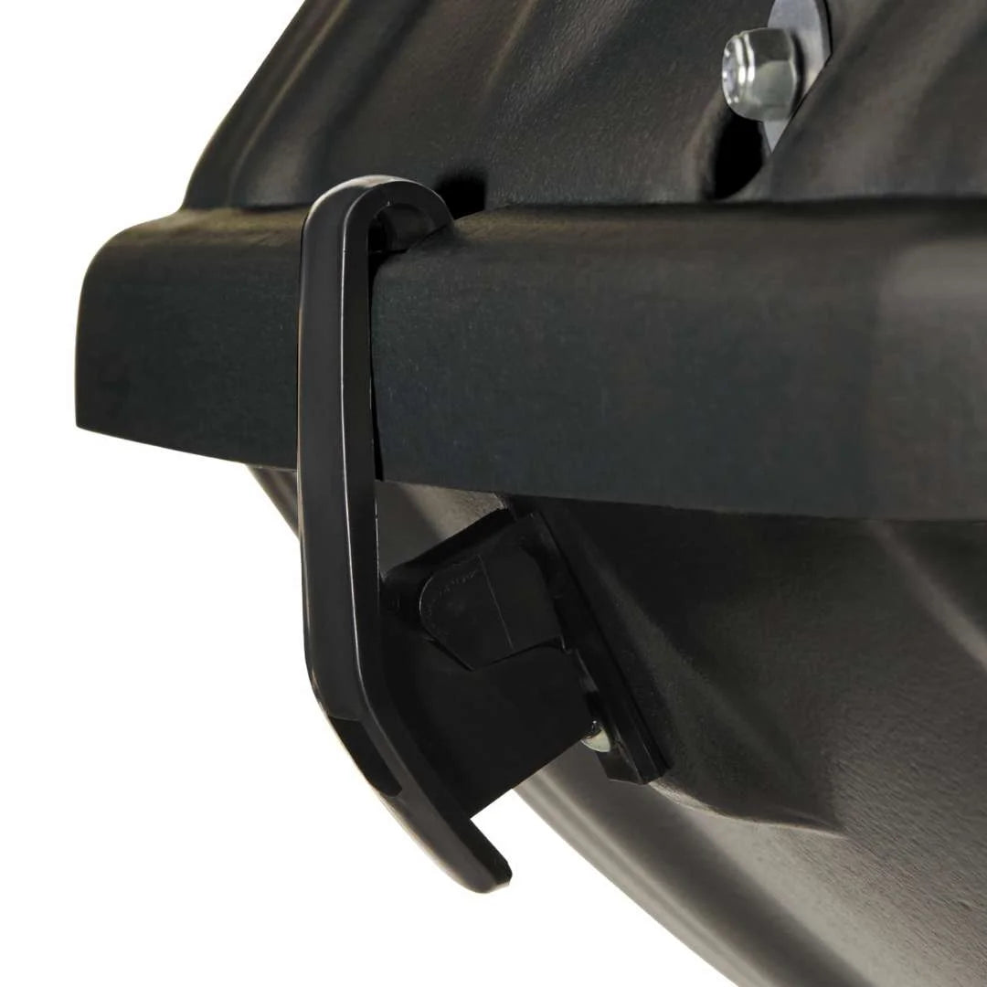 Close-up of U-Bolt mount system securing cargo box to roof rack bar.
