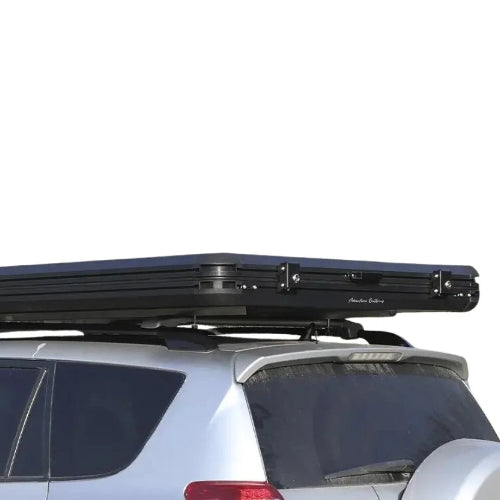 2025 Cocoon AO Clamshell Rooftop Tent closed and mounted on vehicle roof rack for travel