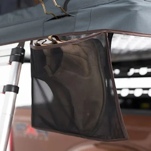 Included hanging shoe bag for Dog House Mesa 4 person rooftop tent
