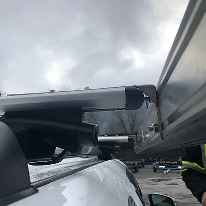 Dog House SUV awning mounted to roof rack with bracket hardware