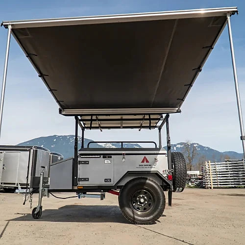 Dog House vehicle awning open on overland trailer for camping shade