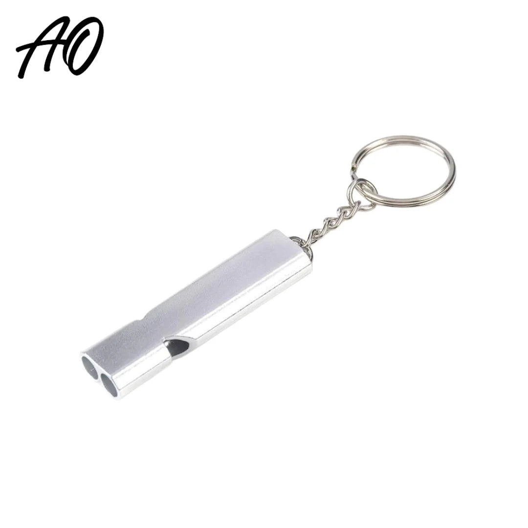 Silver AO emergency survival whistle keychain on white background with AO logo
