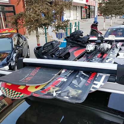 Full-Pull AO Extender ski and snowboard carrier holding multiple skis and snowboards on a vehicle roof rack for winter travel