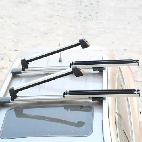 Full-Pull AO Extender ski snowboard roof rack installed on crossbars showing slide-out loading access and low-profile mounting