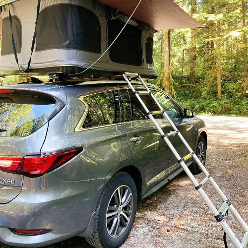 Galaxy Rooftop Tent on SUV with telescoping ladder extended for entry