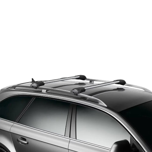 Thule AeroBlade Edge Raised Rail roof rack system installed on vehicle for cargo transport